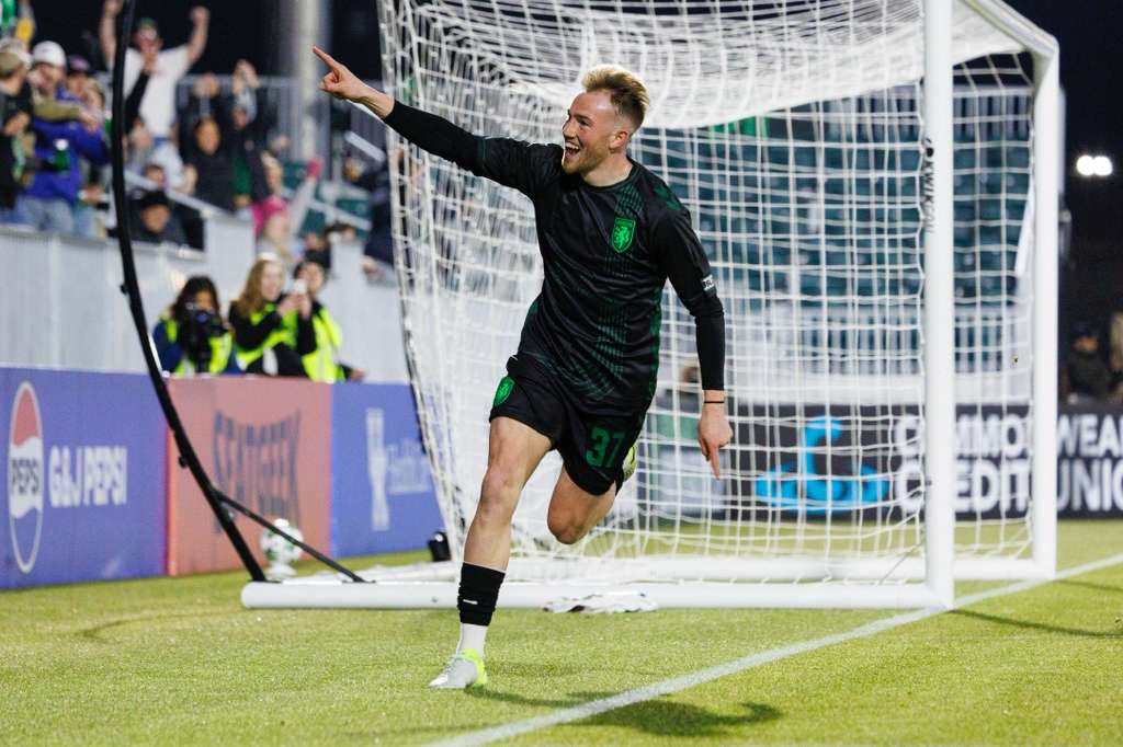 Eliot Goldthorp celebrating by the goal